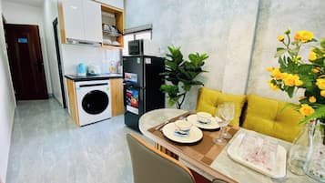 Deluxe Apartment, 1 Queen Bed, Balcony, City View | Desk, laptop workspace, blackout drapes, soundproofing