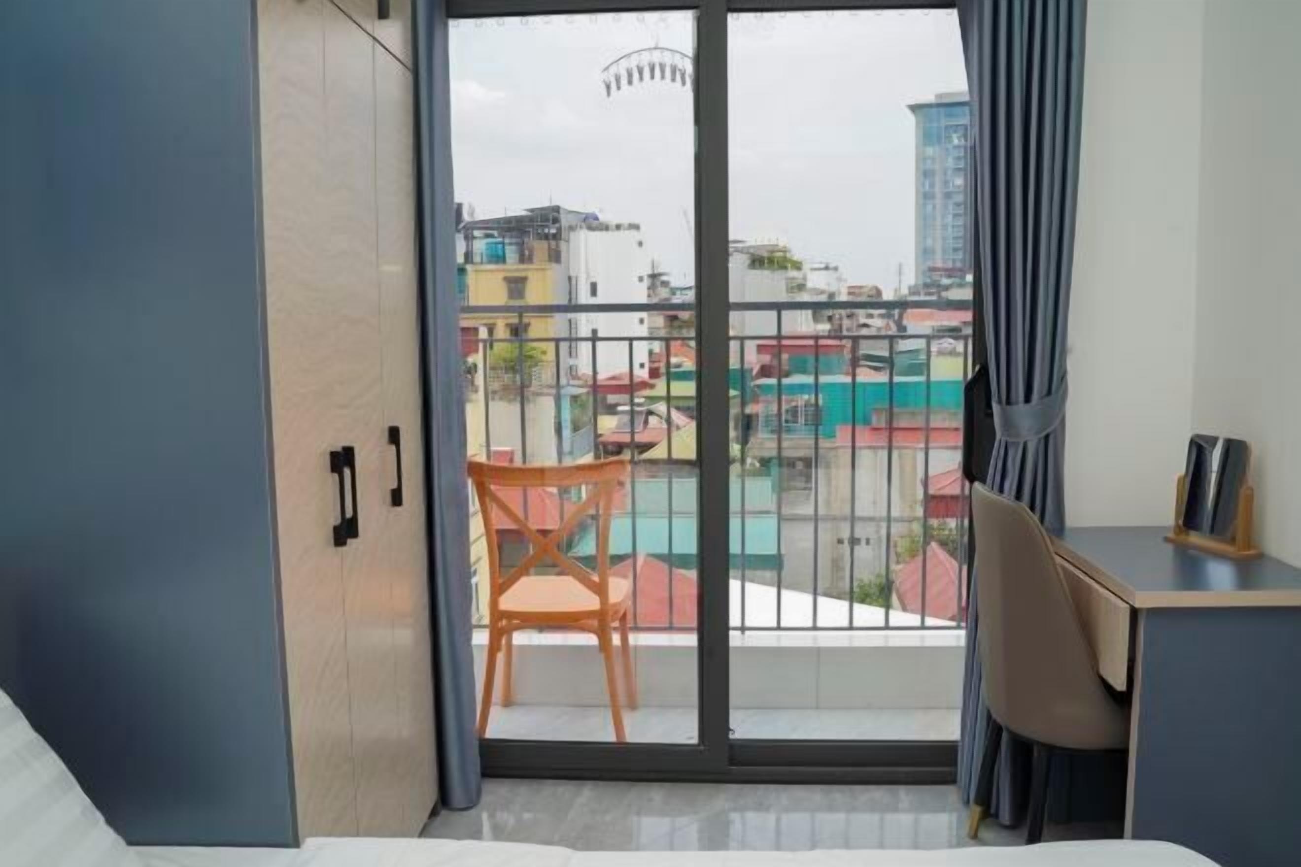 Desk, laptop workspace, blackout curtains, soundproofing