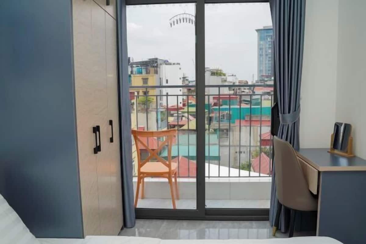 Desk, laptop workspace, blackout curtains, soundproofing