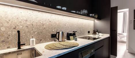 Premium bedding, down comforters, iron/ironing board, cribs/infant beds