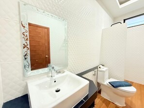 Shower, jetted tub, hair dryer, bidet
