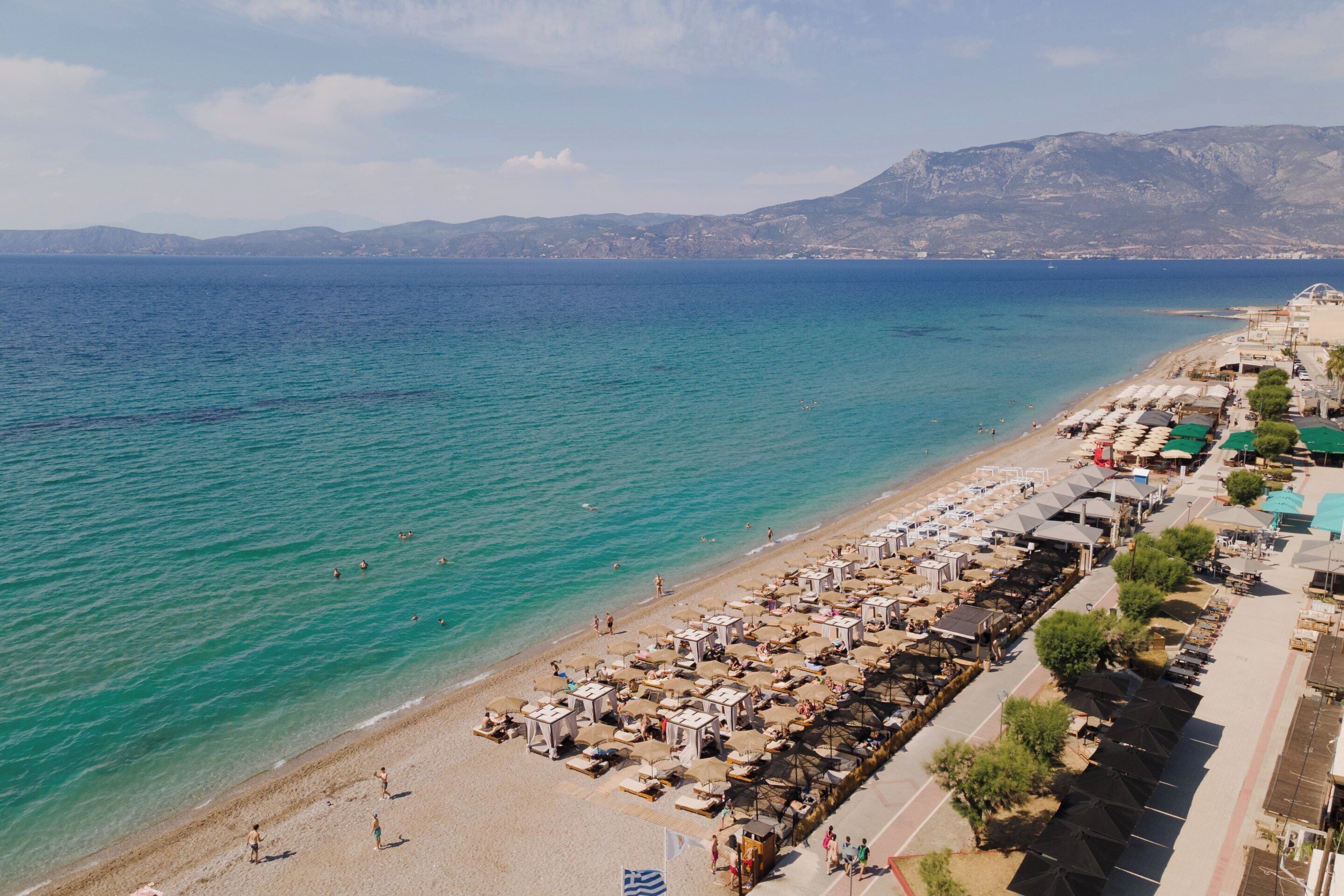 On the beach, beach cabanas, sun-loungers, beach umbrellas