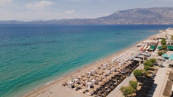 On the beach, beach cabanas, sun-loungers, beach umbrellas