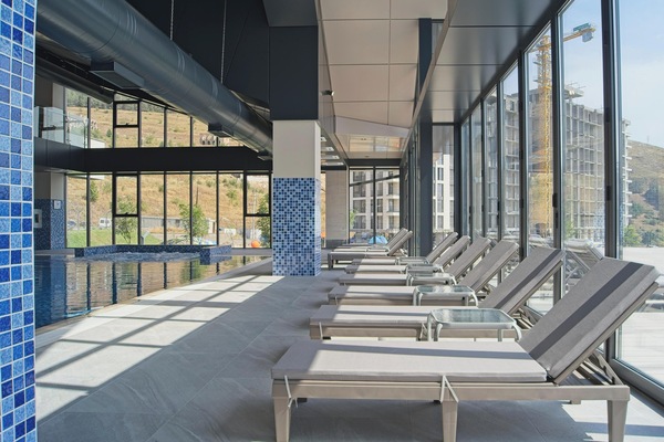 Indoor pool, seasonal outdoor pool, pool umbrellas, sun loungers