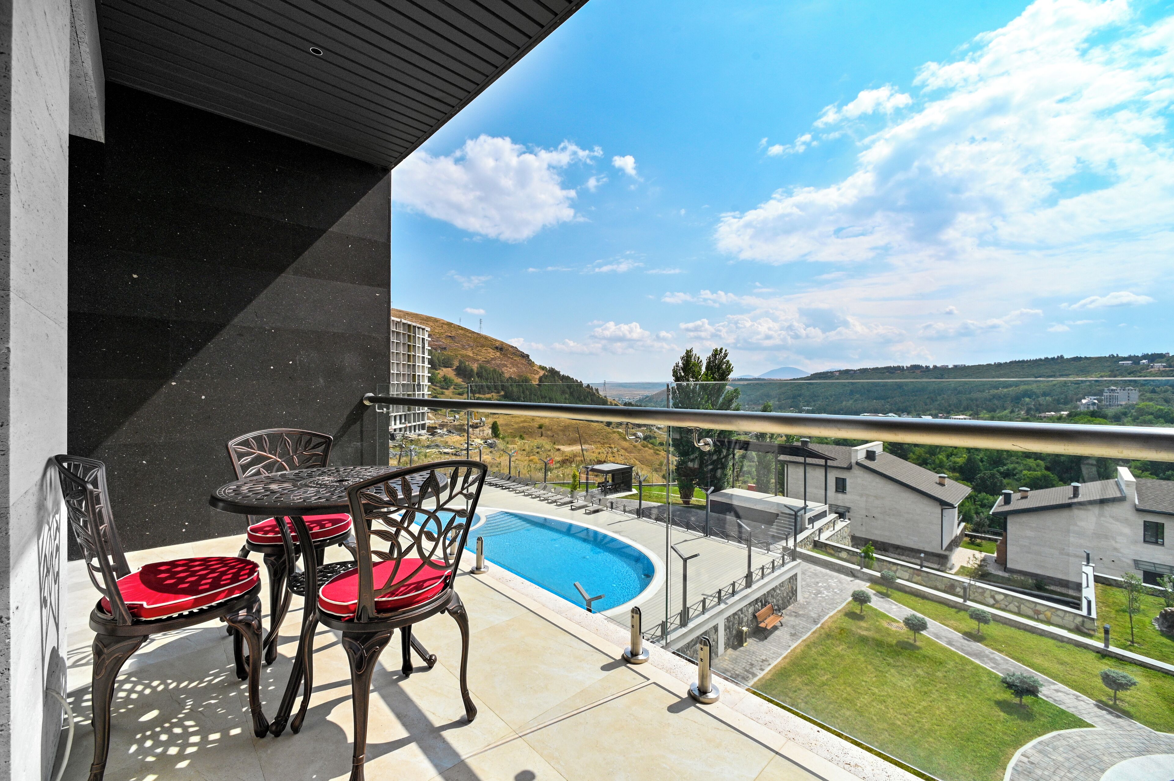 Deluxe Double Room, Balcony, Mountain View | In-room safe, blackout drapes, soundproofing, iron/ironing board