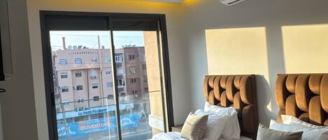 2 habitaciones, tabla de planchar con plancha, wifi y ropa de cama