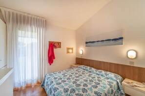 2 habitaciones y ropa de cama