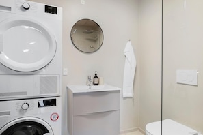 Shower, hair dryer, towels