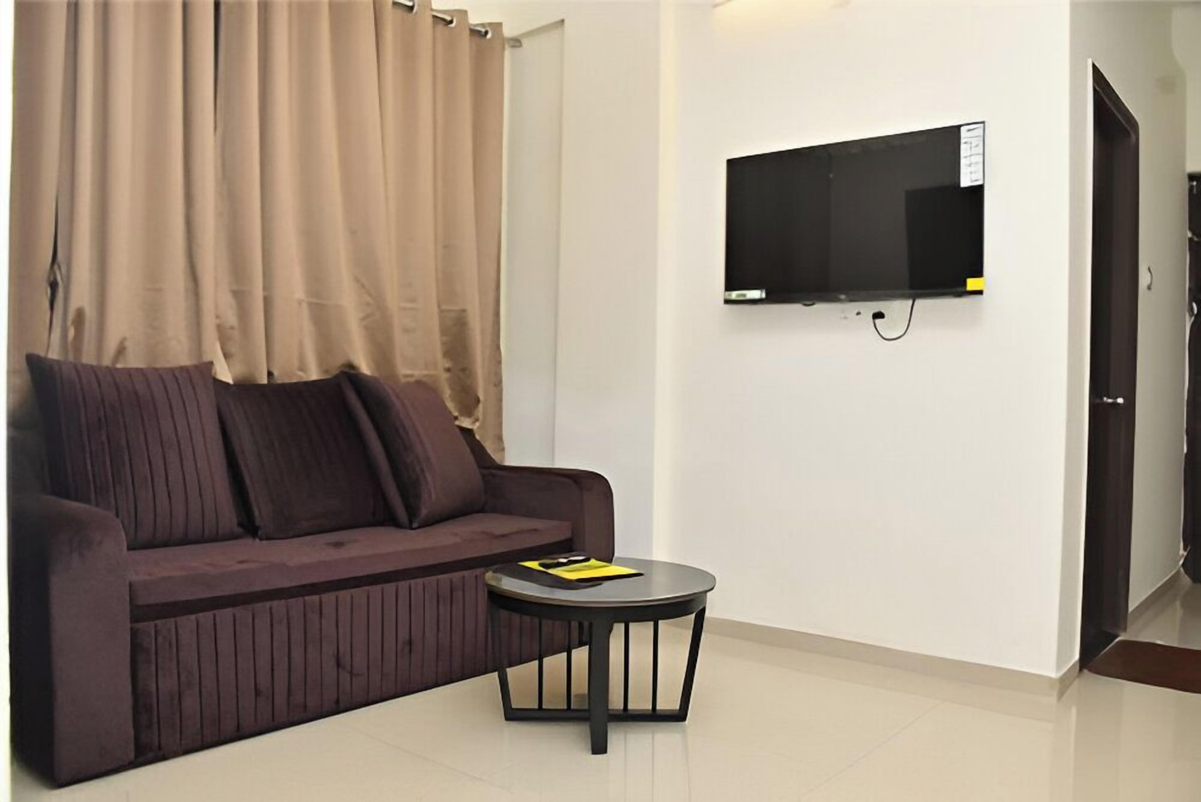 2 BHK ROOM | Living area | 32-inch LCD TV with satellite channels