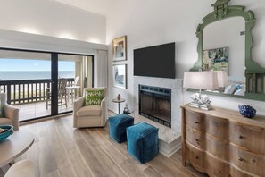 TV, fireplace, books