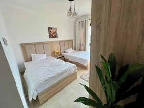 2 bedrooms, iron/ironing board, WiFi - Fancy Duplex in porto new cairo compound near AUC (Cairo Governorate)