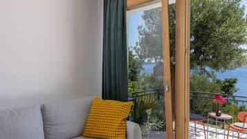 House (Two Bedroom Holiday Home with Terrace) | Living room | 32-inch flat-screen TV with digital channels