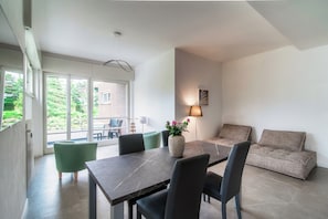 Comfort Apartment, City View | Living area | 43-inch Smart TV with digital channels - Stylish 2-Bedroom Apartment by Lake Como (Como)