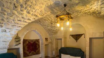 Family Triple Room, Courtyard View | Desk, laptop workspace, soundproofing, iron/ironing board