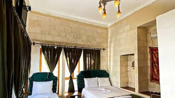 Family Triple Room, Courtyard View | Desk, laptop workspace, soundproofing, iron/ironing board