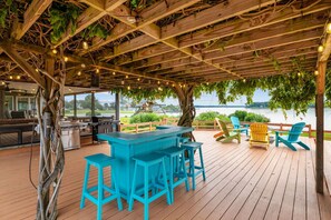 Outdoor dining - Bayfront Oasis with Heated Pool, Hot Tub & Playground! Family & Pet friendly! (Reedville)