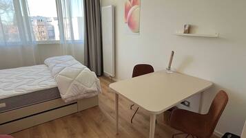 1 bedroom, laptop workspace, iron/ironing board, bed sheets