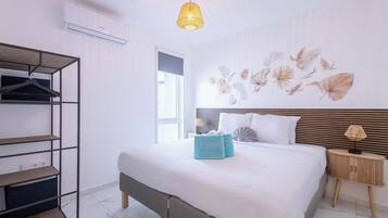 3 habitaciones, tabla de planchar con plancha, wifi y ropa de cama