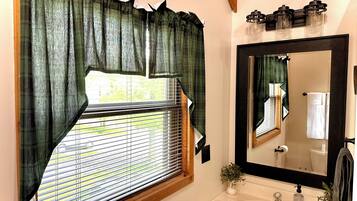 Jetted tub, hair dryer, towels, soap