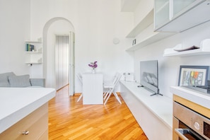 Comfort Apartment, City View | Living area | 43-inch Smart TV with digital channels