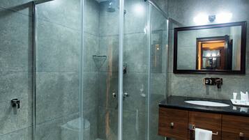 Shower, hair dryer, slippers, towels