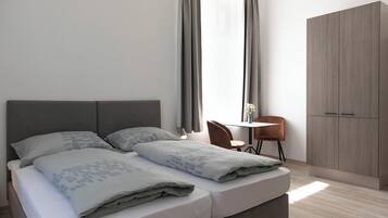 Blackout drapes, free WiFi, bed sheets