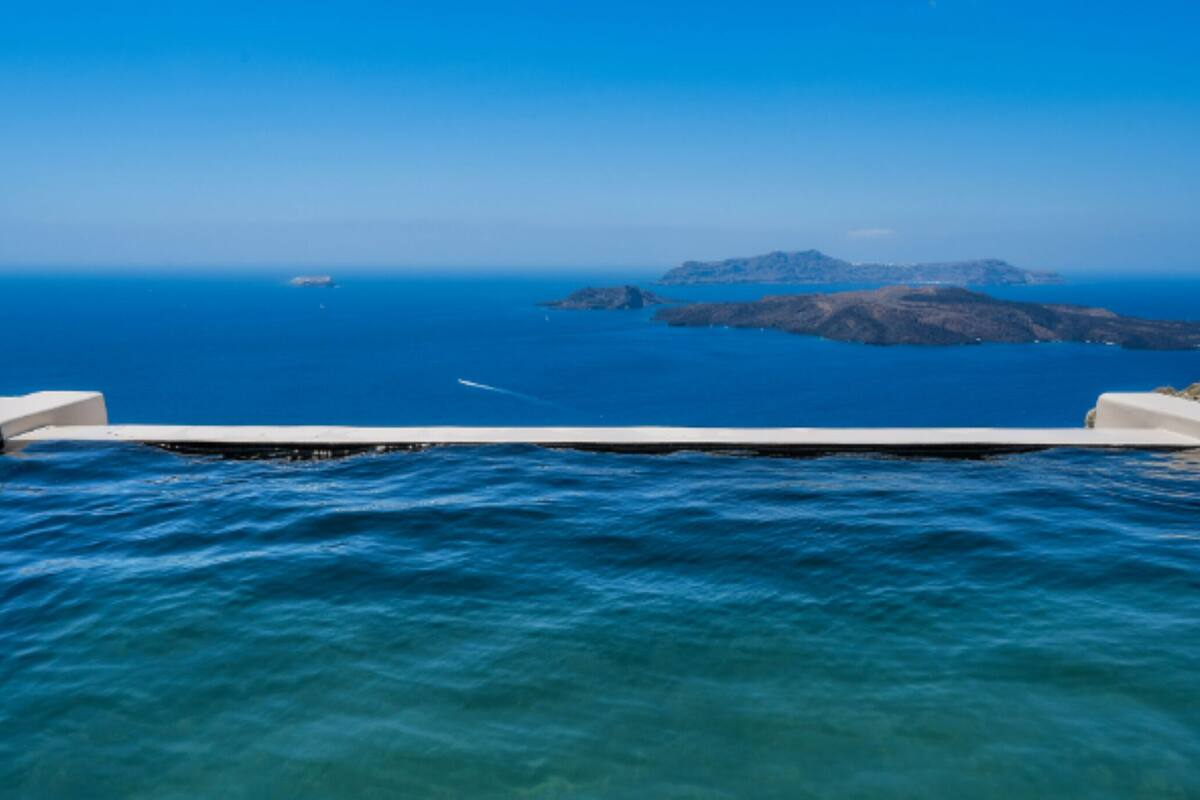 A clear view of the ocean and a distant island.