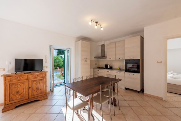 Classic Apartment, City View | Living area | 43-inch Smart TV with digital channels