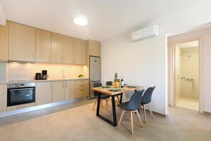 Apartment, 2 Bedrooms, City View | Private kitchen | Full-size fridge, oven, stovetop, coffee/tea maker