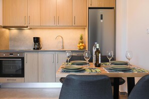 Apartment, 2 Bedrooms, City View | Private kitchen | Full-size fridge, oven, stovetop, coffee/tea maker