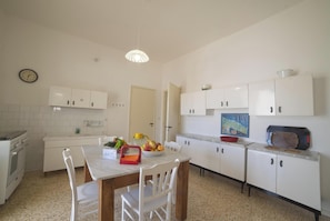 Family Villa, Multiple Bedrooms (Giulia Apartment 2 Sea View) | Private kitchen | Fridge, oven, stovetop, coffee/tea maker