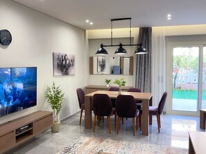 Apartment, 3 Bedrooms, Smoking, Patio | Dining room - Hotel Apartment in Sheikh Zayed Zayed Suites A (6th of October City)