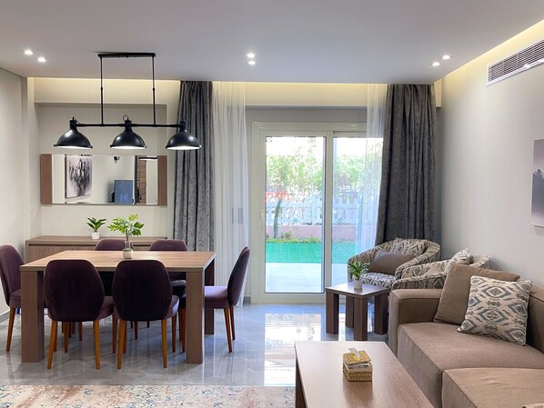 Apartment, 3 Bedrooms, Smoking, Patio | Dining room - Hotel Apartment in Sheikh Zayed Zayed Suites A (6th of October City)