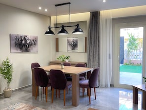 Apartment, 3 Bedrooms, Smoking, Patio | Dining room - Hotel Apartment in Sheikh Zayed Zayed Suites A (6th of October City)