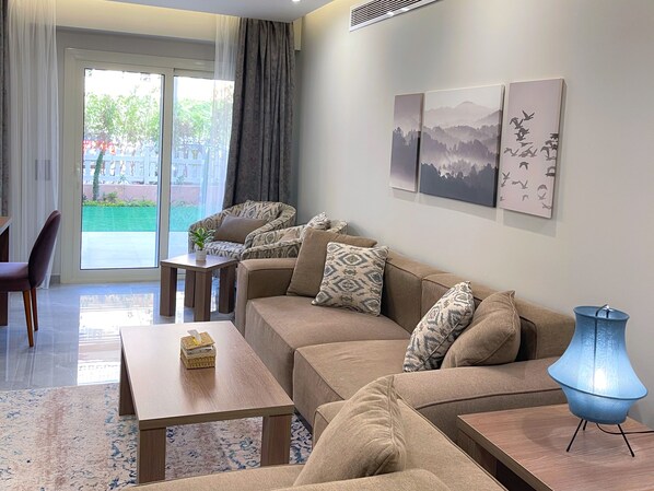 Apartment, 3 Bedrooms, Smoking, Patio | Living room - Hotel Apartment in Sheikh Zayed Zayed Suites A (6th of October City)