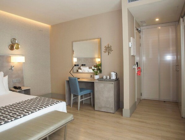 Pillow-top beds, free minibar, desk, laptop workspace