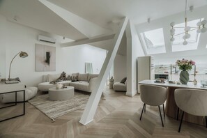 Deluxe Apartment, City View | Living area | 55-inch Smart TV with digital channels - La Belle Epoque (Warsaw)
