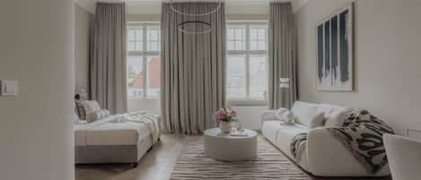 Superior Apartment, Balcony, City View | Living room | 55-inch Smart TV with digital channels