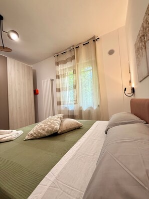 1 chambre, fer et planche à repasser, Wi-Fi gratuit, draps fournis