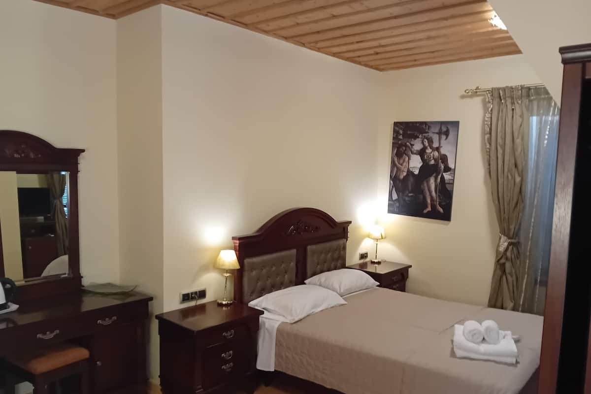 Deluxe Triple Room, City View | In-room safe, iron/ironing board, free WiFi, bed sheets