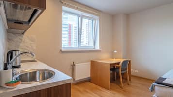 Standard Room, City View | Private kitchen | Mini-fridge, stovetop