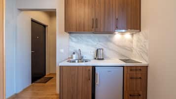 Standard Room, City View | Private kitchen | Mini-fridge, stovetop