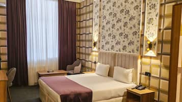 Select Comfort beds, minibar, in-room safe, desk
