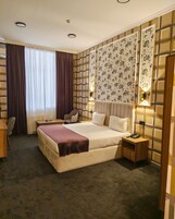 Select Comfort-bedden, een minibar, een kluis op de kamer, een bureau