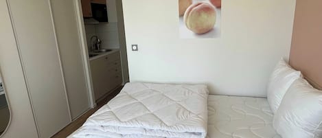 1 bedroom, laptop workspace, iron/ironing board, bed sheets
