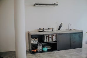 Fridge, microwave, stovetop, cookware/dishes/utensils