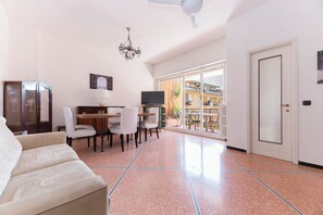 Deluxe Apartment, 2 Bedrooms, Terrace, City View | Living area | 43-inch Smart TV with digital channels - Pesto Home Holiday (Rapallo)