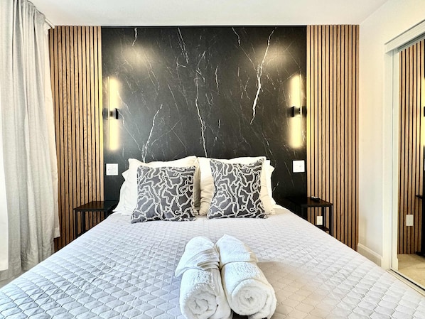 2 habitaciones, tabla de planchar con plancha, cuna de viaje y wifi 