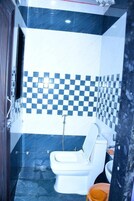 Suite Deluxe | Baño | Albornoces, zapatillas, toallas y jabón