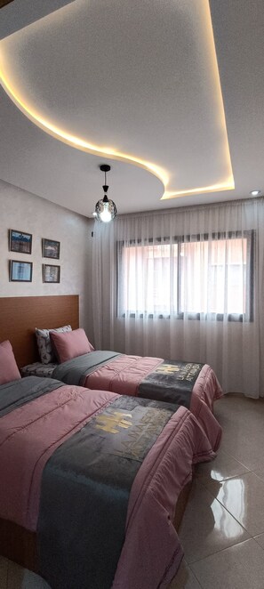 3 habitaciones, tabla de planchar con plancha y wifi gratis